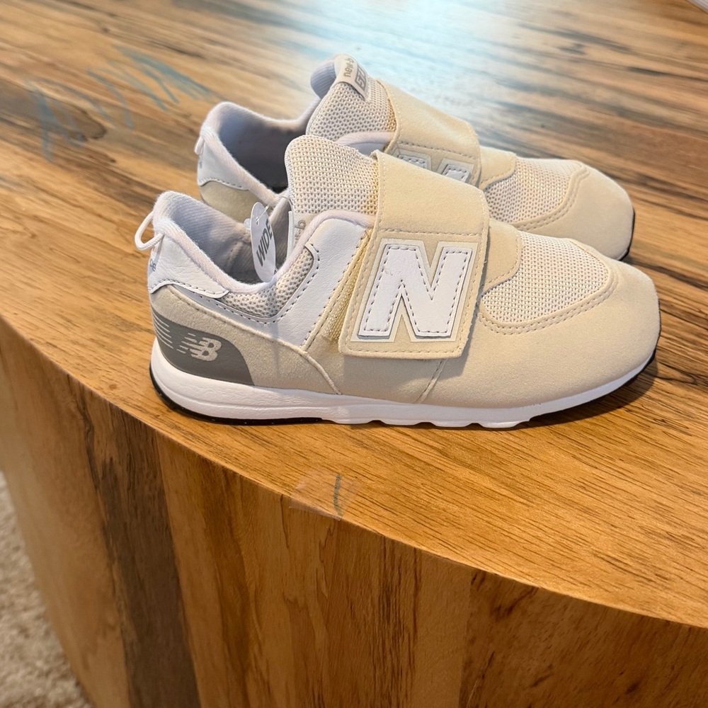 New Balance Kids Cream and Gray Sneakers